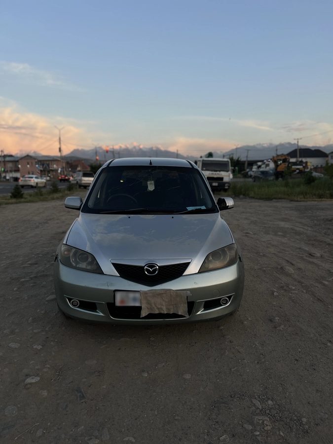 Mazda Demio II (DY) 2004