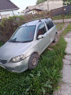 Mazda Demio II (DY)