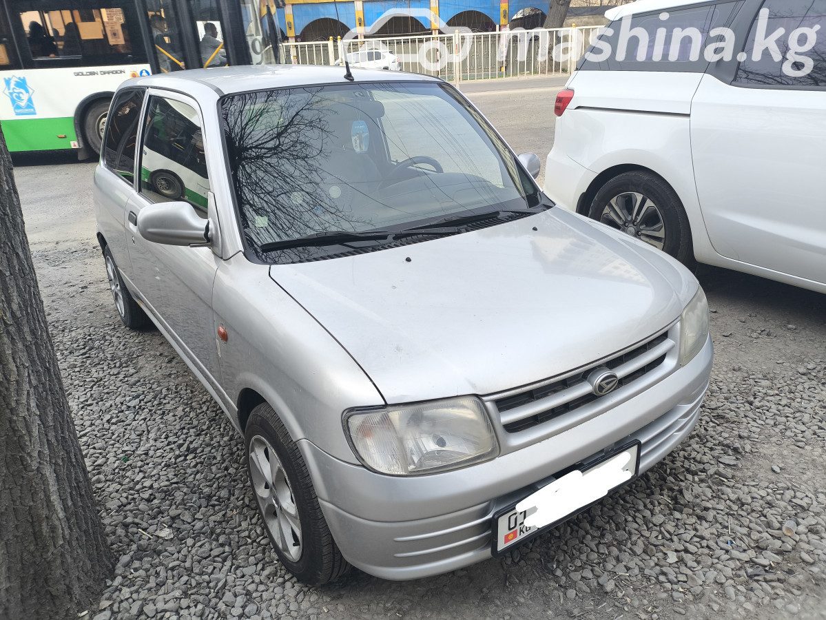 Daihatsu Cuore V (L700)