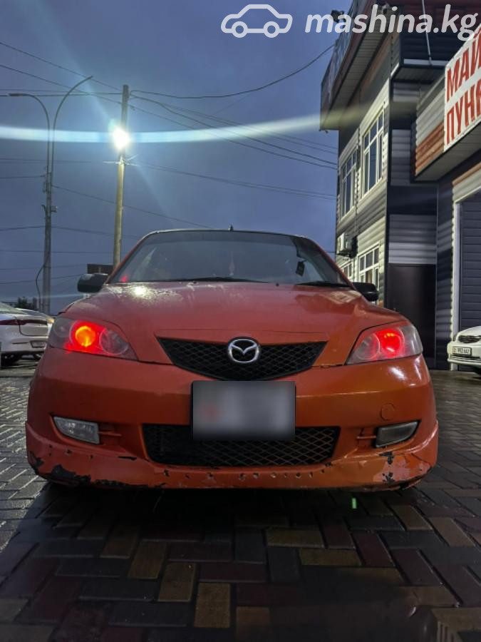 Mazda Demio II (DY)