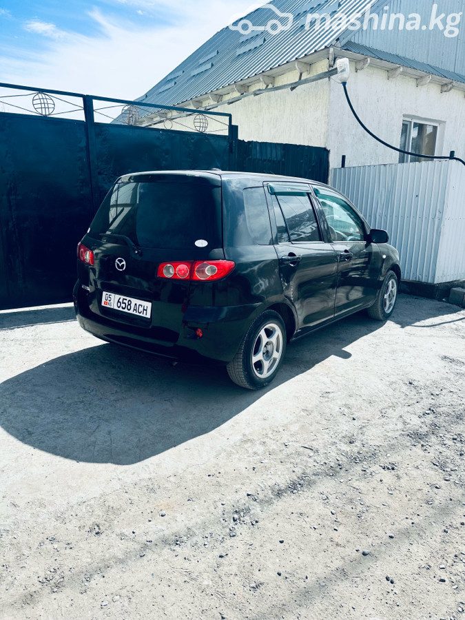 Mazda Demio II (DY)