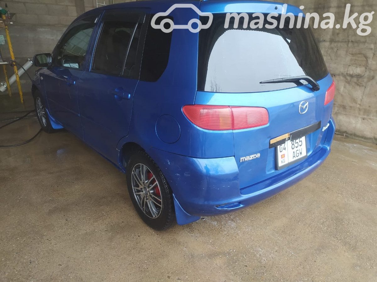 Mazda Demio II (DY)