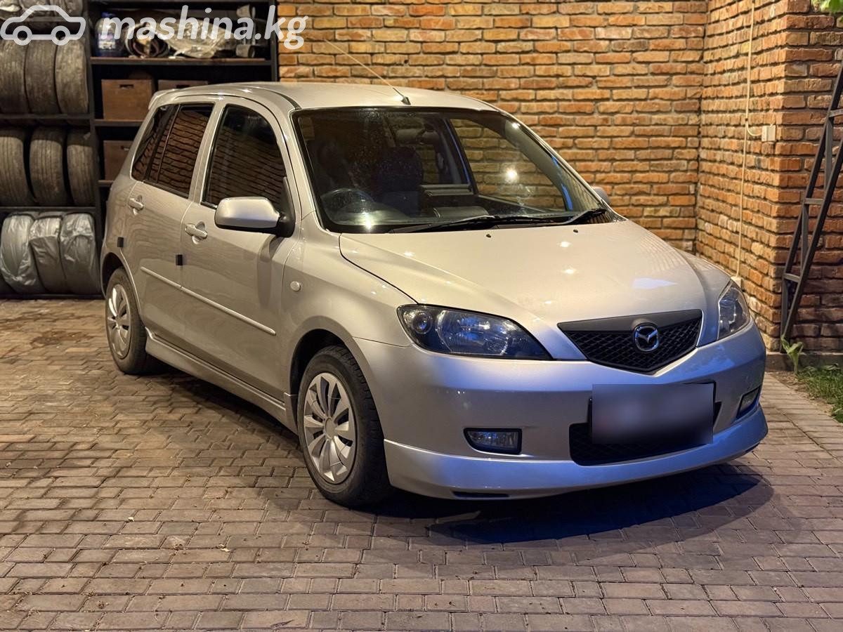 Mazda Demio II (DY)