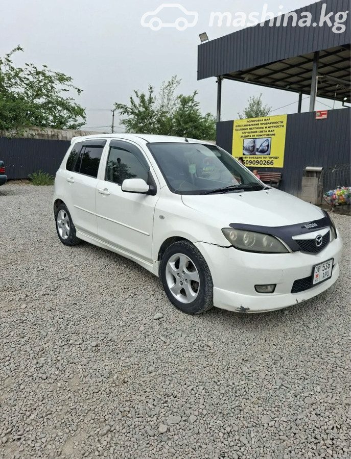 Mazda Demio II (DY)