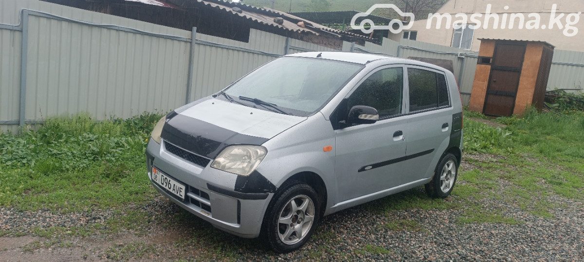 Daihatsu Cuore VI (L251)
