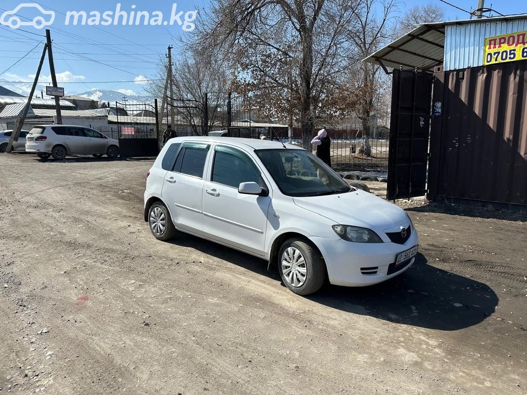 Mazda Demio II (DY)