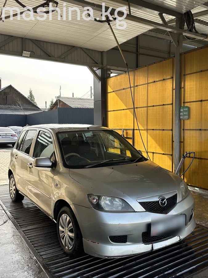 Mazda Demio II (DY) 2003