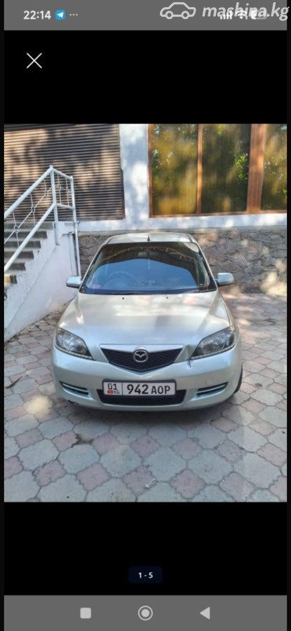 Mazda Demio II (DY)
