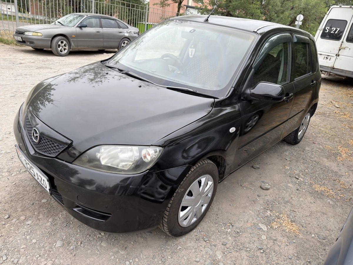 Mazda Demio II (DY) 2002