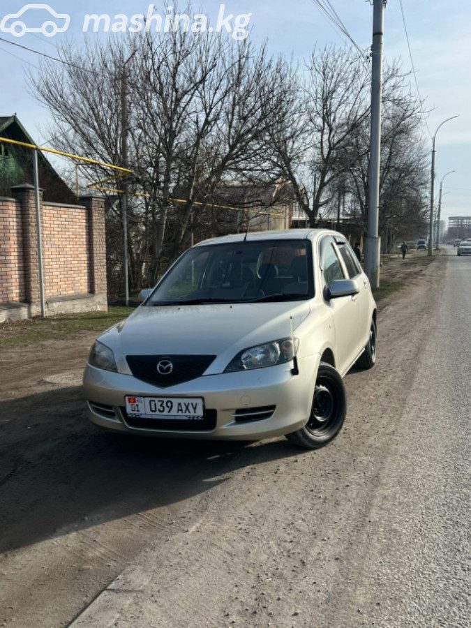 Mazda Demio II (DY)