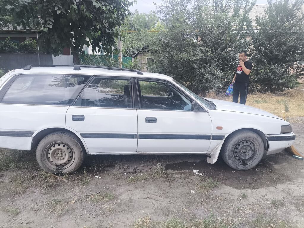 Белый универсал (5 дверей), левый руль. Кузов с продольными рейлингами