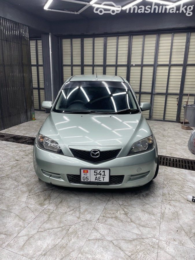 Mazda Demio II (DY)
