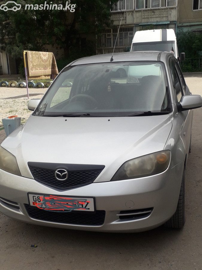 Mazda Demio II (DY)