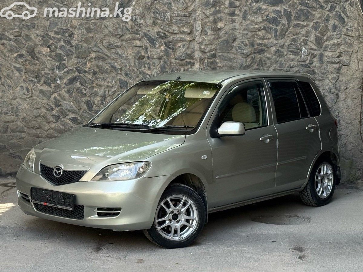 Mazda Demio II (DY)
