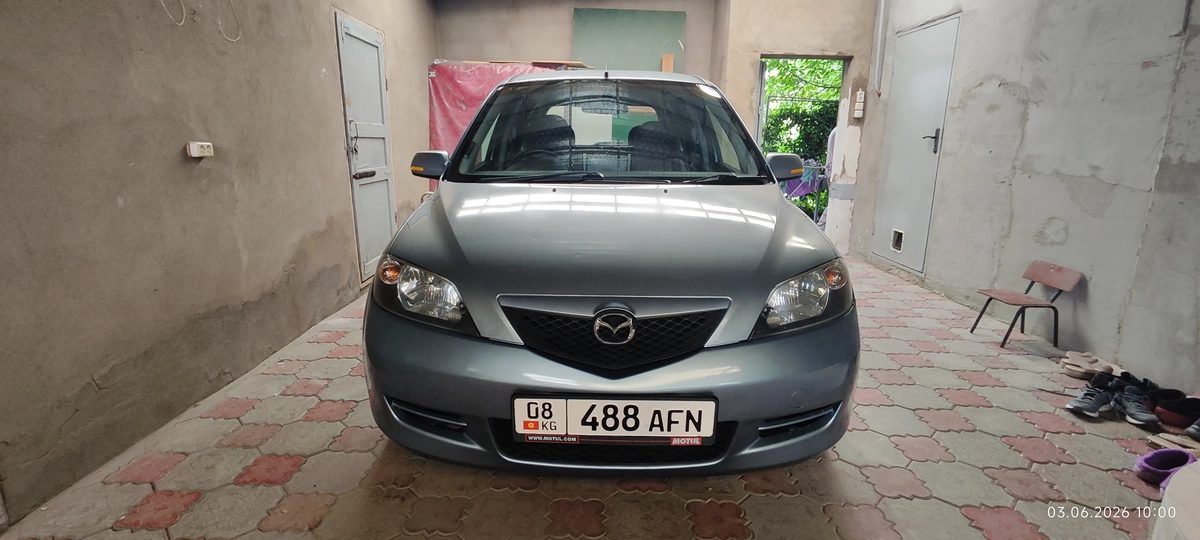 Mazda Demio II (DY) 2004